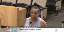 Screengrab from public safety meeting of Cynthia speaking into microphone